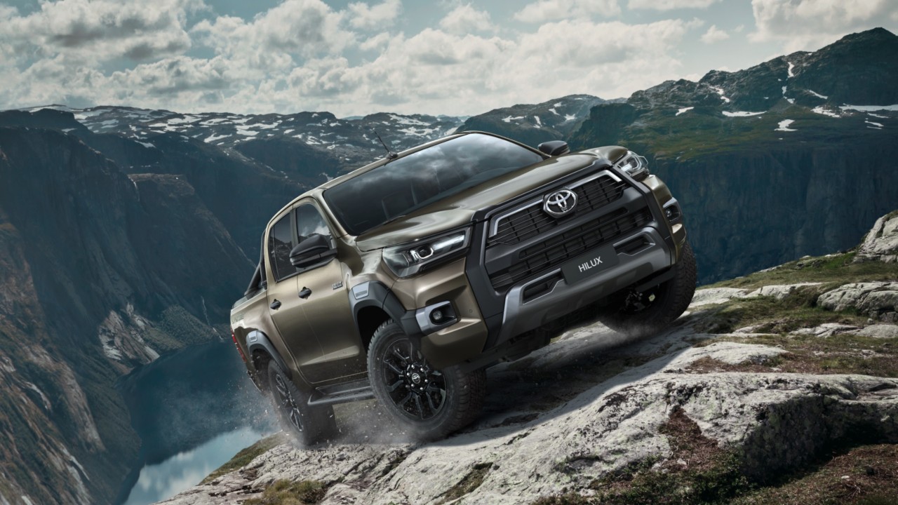 Toyota Hilux driving up a hill