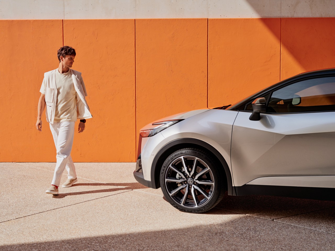 a person looking at an All-New Toyota C-HR