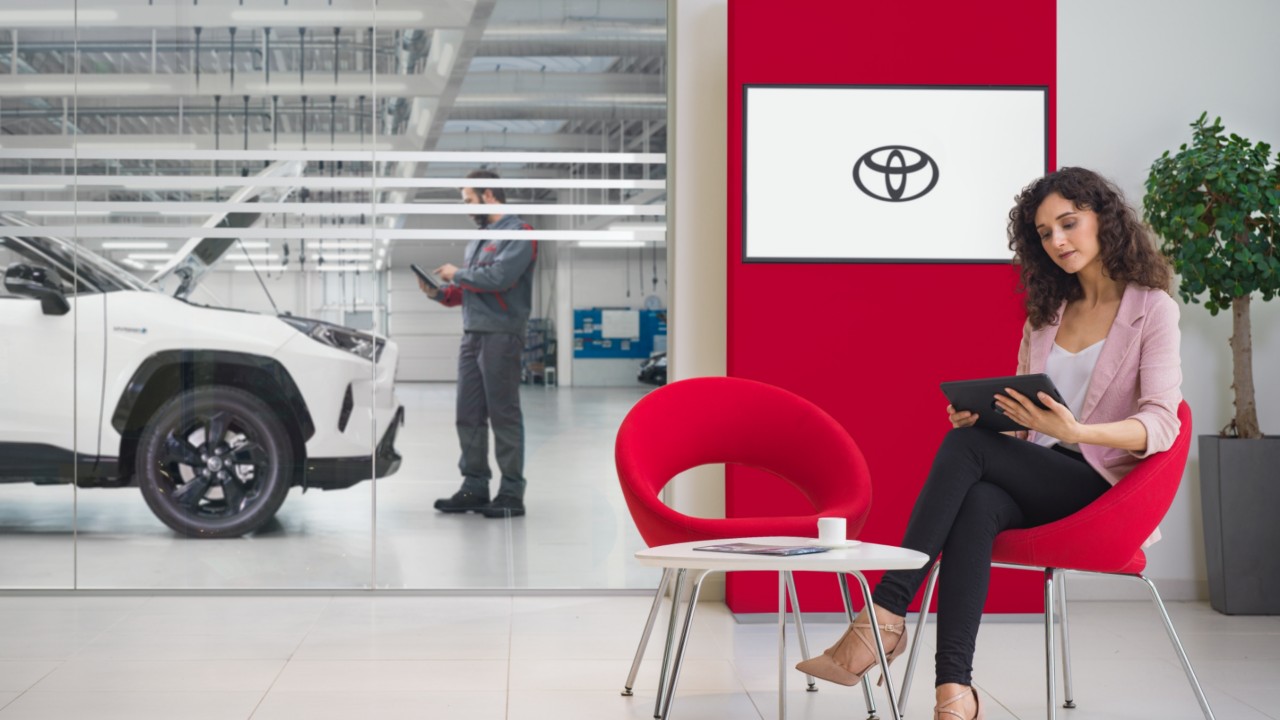 Toyota service with a customer waiting